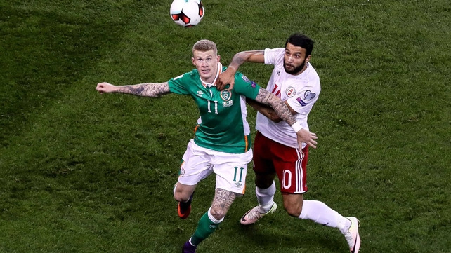 James McClean out-muscles Tornike Okriashvili of Georgia