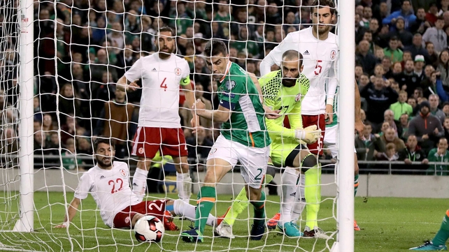 Ireland captain Seamus Coleman bundles home the first goal of the game after a forceful run