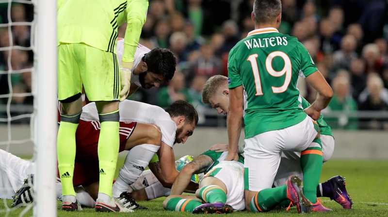 Robbie Brady down after the clash of heads