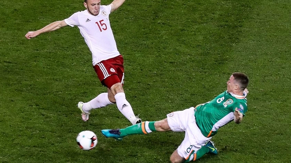 McCarthy goes in bravely for a ball against Valerian Gvilia of Georgia