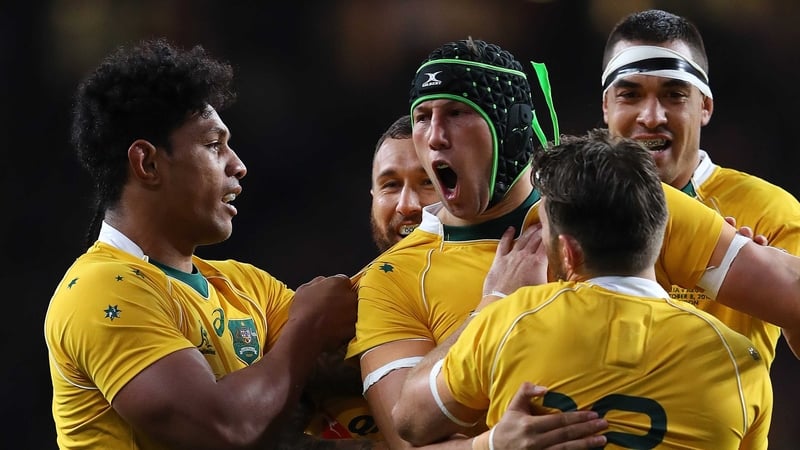 The Aussies celebrate Adam Coleman's opening try