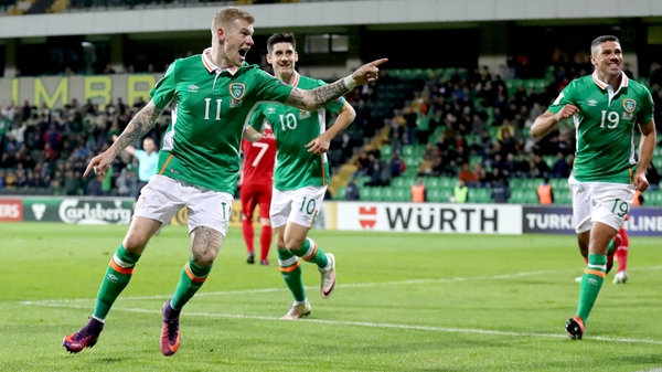 James McClean celebrates scoring the second goal of the game