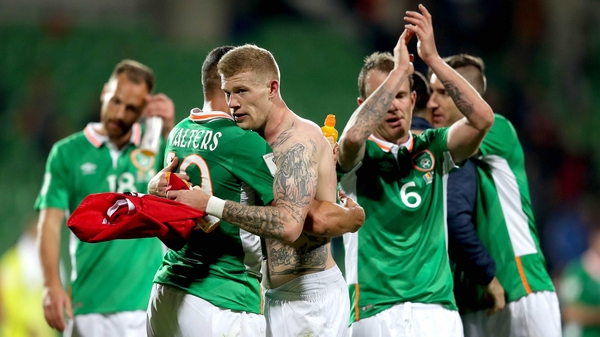Jonathan Walters hugs goal hero James McClean at full time