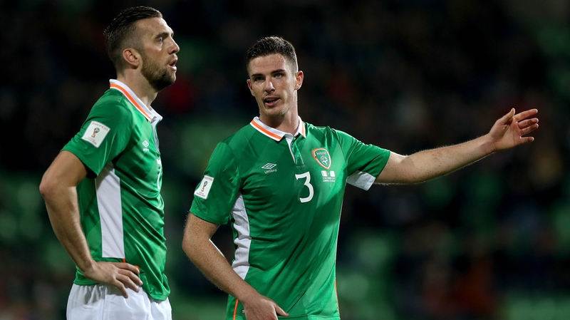 Ireland centre halves Shane Duffy and Ciaran Clark talk during the away in over Moldova