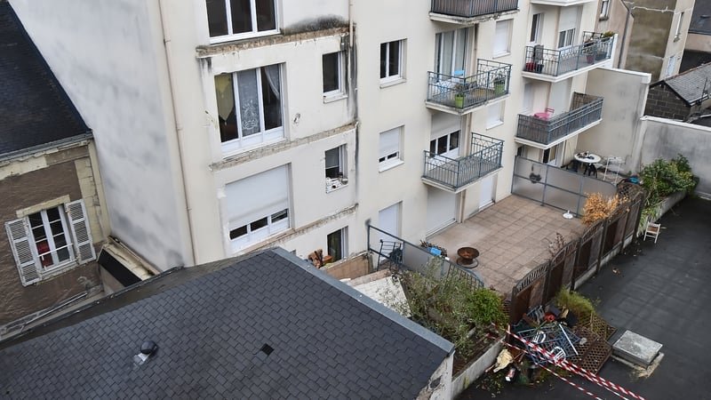 Debris is seen on the ground after a third floor balcony collapsed in the city of Angers
