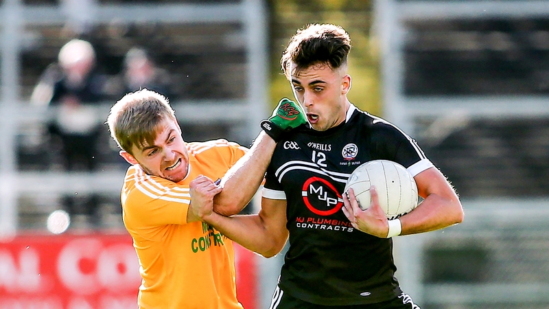 Ryan Johnston (r) got the vital goal for Kilcoo