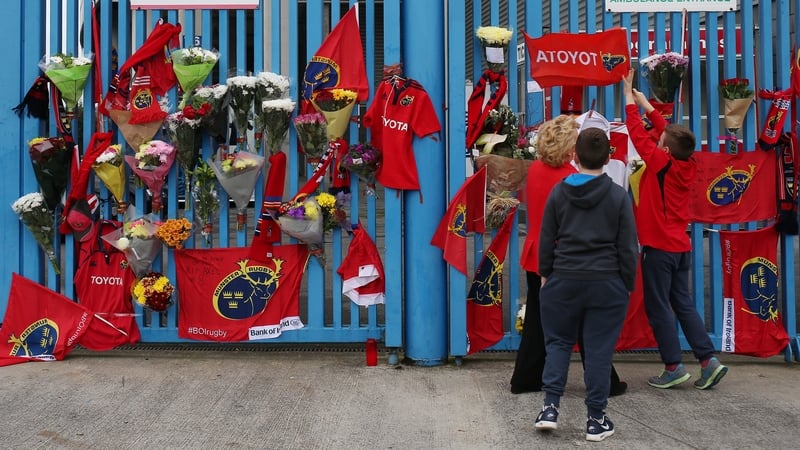 Munster Rugby fans place tributes outside Thomond Park in Limerick