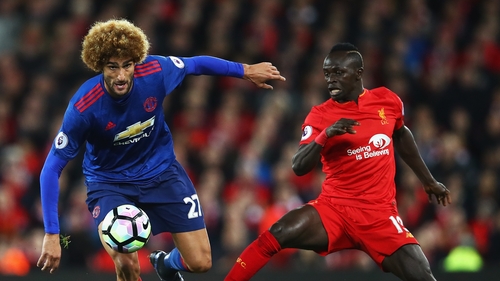 Sadio Mane challenges Marouane Fellaini