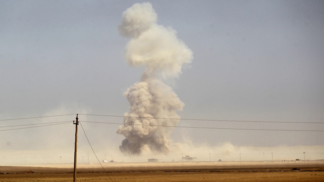 Smoke billows as Iraqi forces deploy south of Mosul