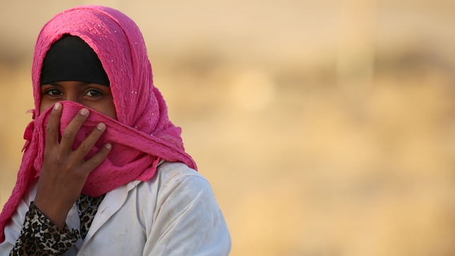 A young girl is pictured at a refugee camp housing Iraqi families who fled the fighting