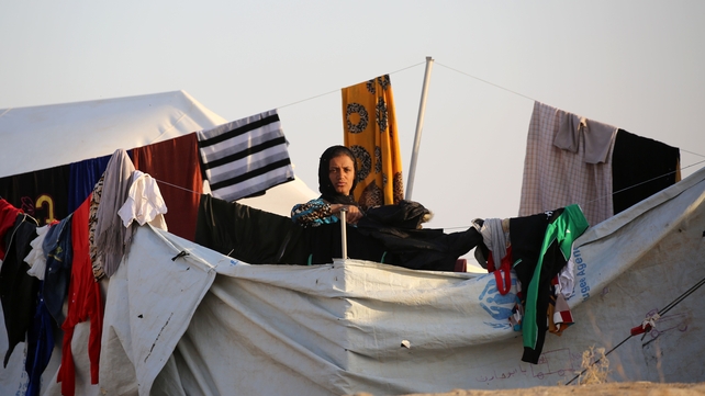 A woman is seen at a refugee camp housing Iraqi families