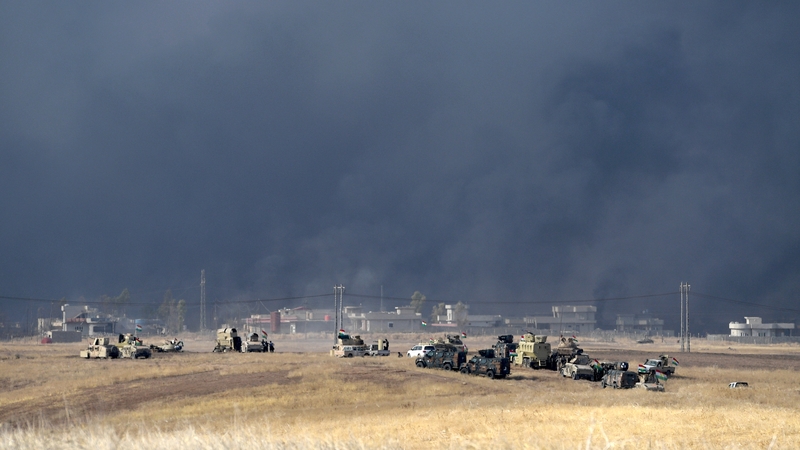 Kurdish peshmerga forces are seen near Mosul as they battle to recapture the village of Tiskharab from IS