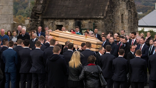 The coffin of Munster head coach Anthony Foley leaves St Flannan’s Church