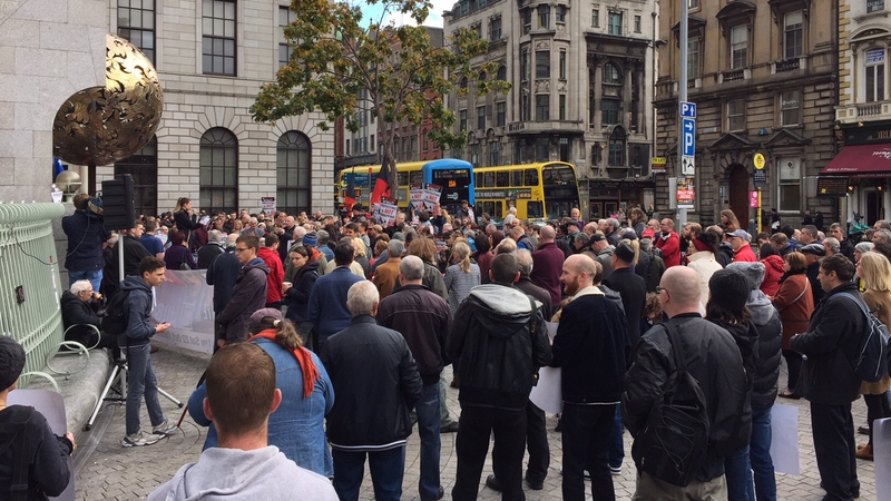 Protesters gathered at the Central Bank before marching through the city