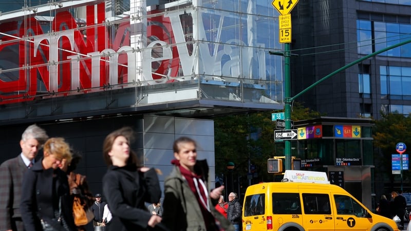 Time Warner said it remained on track to close the deal with AT&T later this year