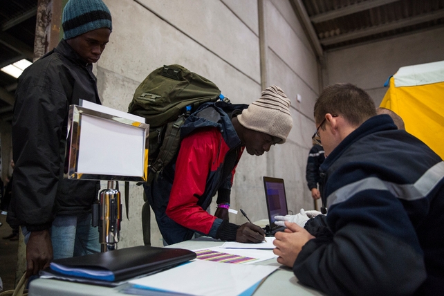 Aid workers were advising refugees and migrants to register for the buses together as they believe this will give certain groups of friends or communities the best chance of not being separated