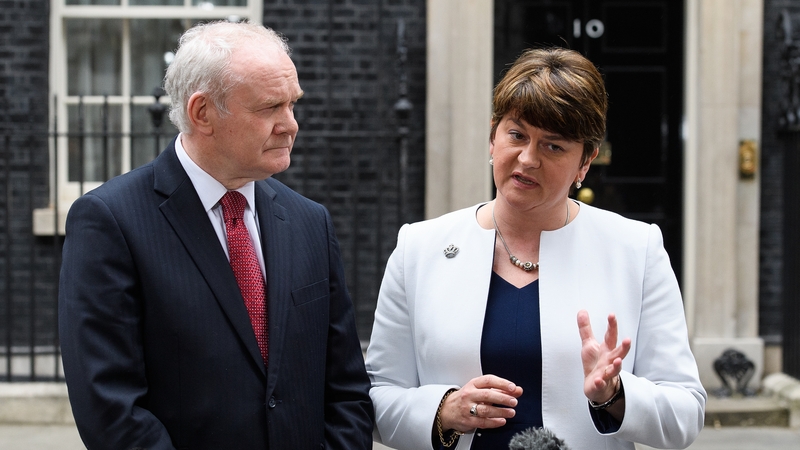 Northern Ireland Deputy and First Ministers Martin McGuinness (L) and Arlene Foster speaking outside No 10 Downing St