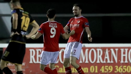 Conan Byrne celebrates a first-half goal against Dundalk