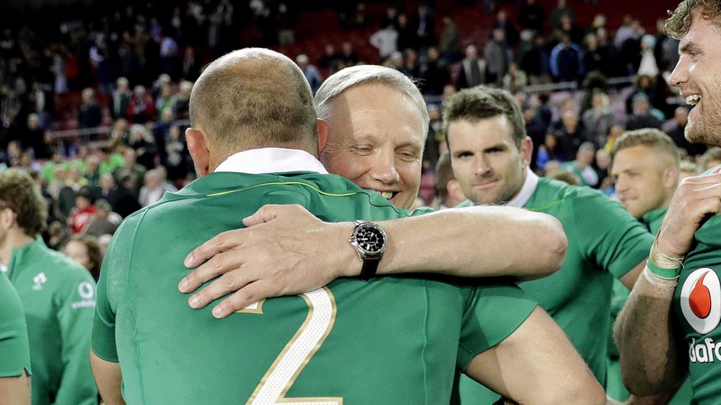 Joe Schmidt embraces Rory Best after the defeat of South Africa at Newlands Stadium