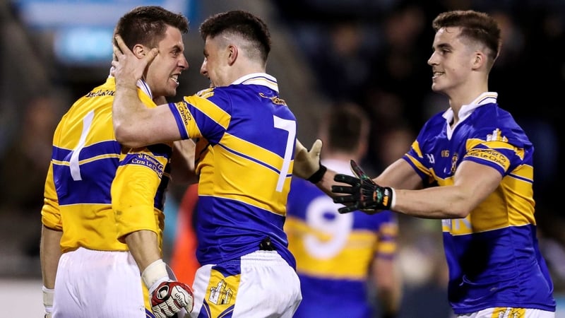 Morven Connolly celebrates with Tom Quinn and Eoin O'Brien at full time