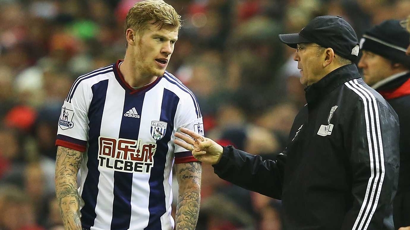 Tony Pulis (R) passes on instructions to Republic of Ireland winger James McClean