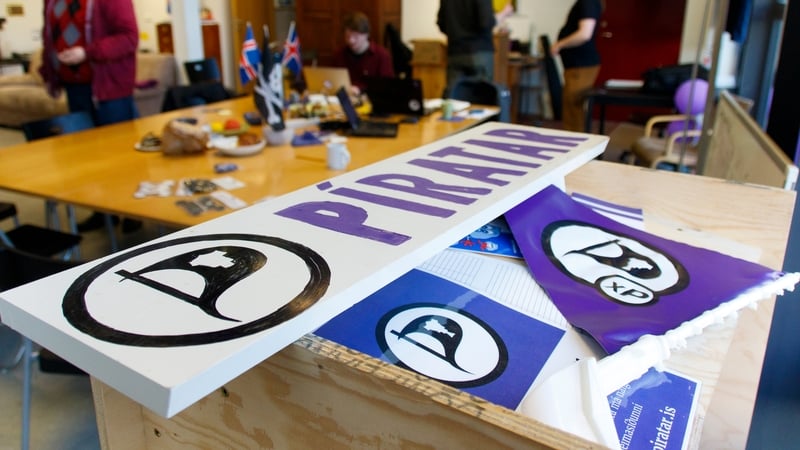 Pirate Party members speak to voters in 'Tortuga', their campaign HQ in Reykjavik