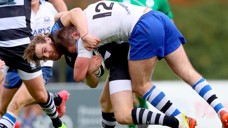 Old Belvedere's Sean Coughlan and Niall Kenneally of Cork Constitution