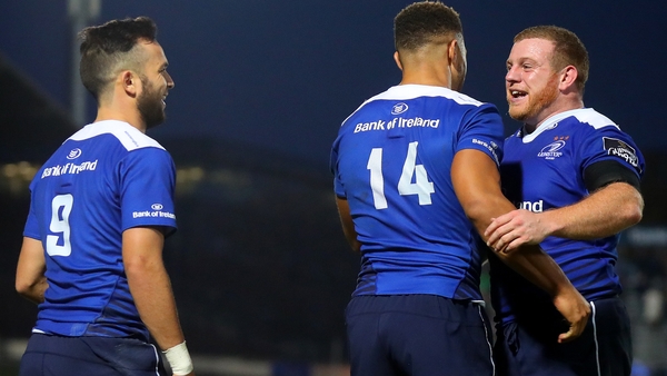 Jamison Gibson-Park and Sean Cronin celebrate with Adam Byrne after his second half try