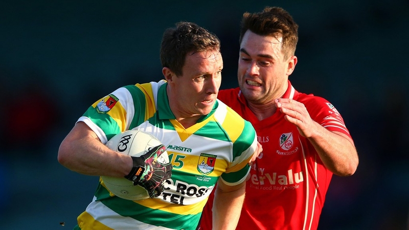 Monaleen's John O’Dwyer tries to dispossess John Hayes of Carberry Rangers