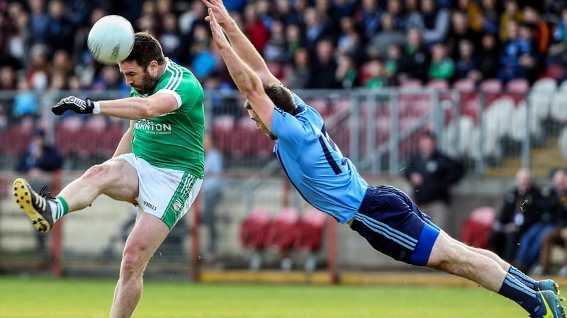 Micheal Magill of Cargin and Emmett McFadden of Killyclogher