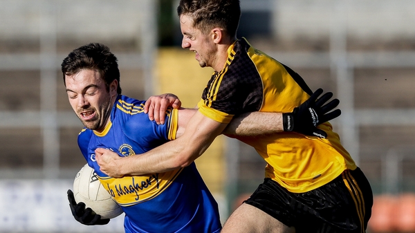 Aidan Forker fends off Brian O'Connell