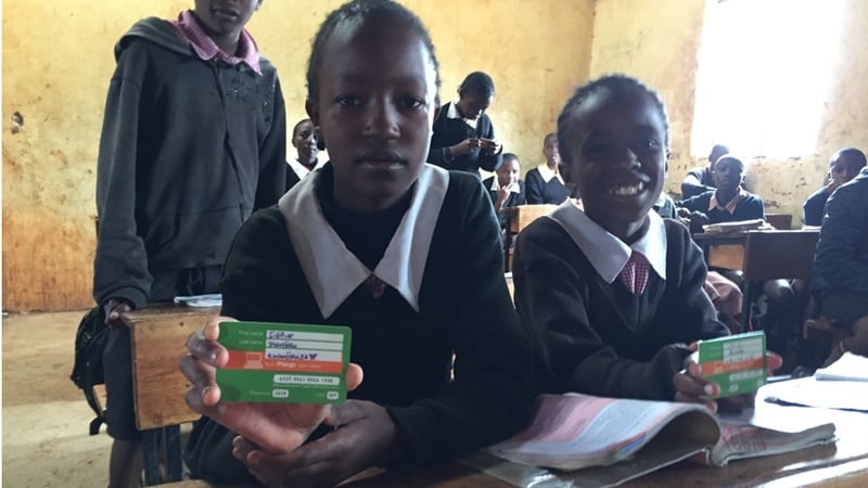 Children use smart cards to help keep their school keep track of attendance