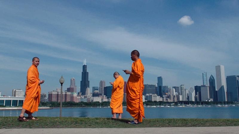 Lo and Behold: Buddhist monks check their phones on a deserted Chicago morning in Werner Herzog's intriguing exposé.