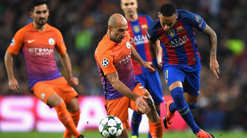 Pablo Zabaleta holds off Neymar at the Nou Camp
