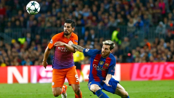 Nolito in action against Messi in the Nou Camp