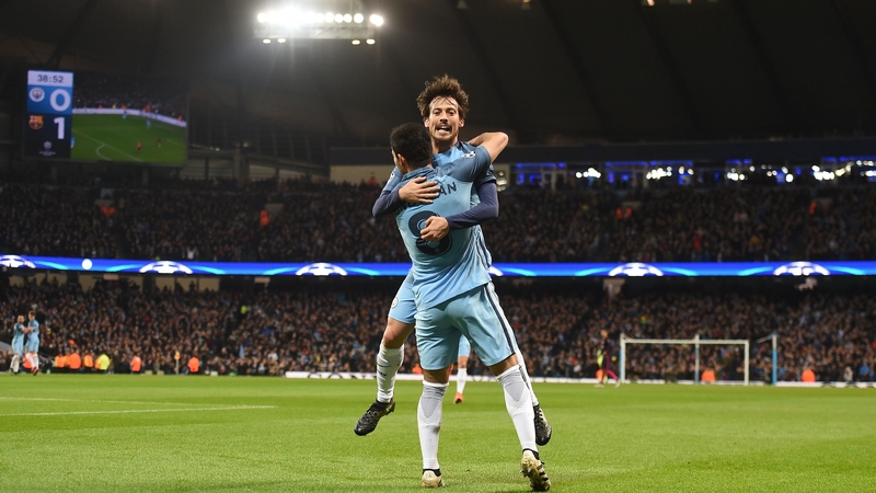 Silva and Gundogan celebrate City's first goal