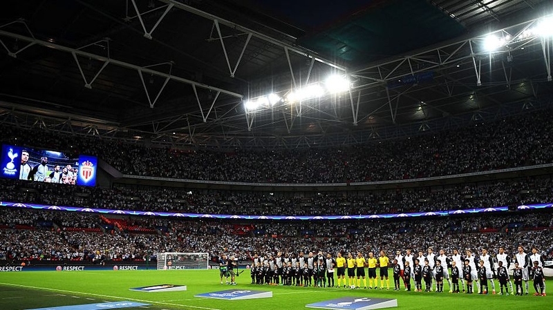 The teams line up at Wembley prior to Spurs' meeting with Monaco