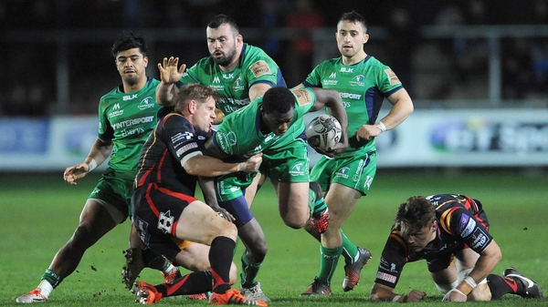 Connacht's Niyi Adeolokun is tackled by Dragons' Rhys Thomas
