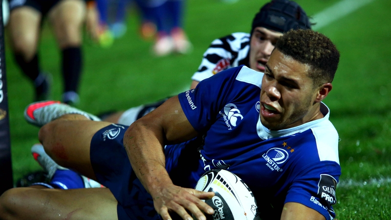 Adam Byrne scoring one of his three tries against Zebre