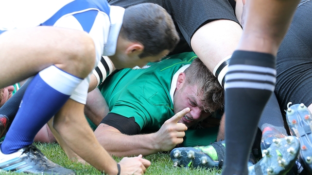 Jordi Murphy celebrates scoring Ireland's first try
