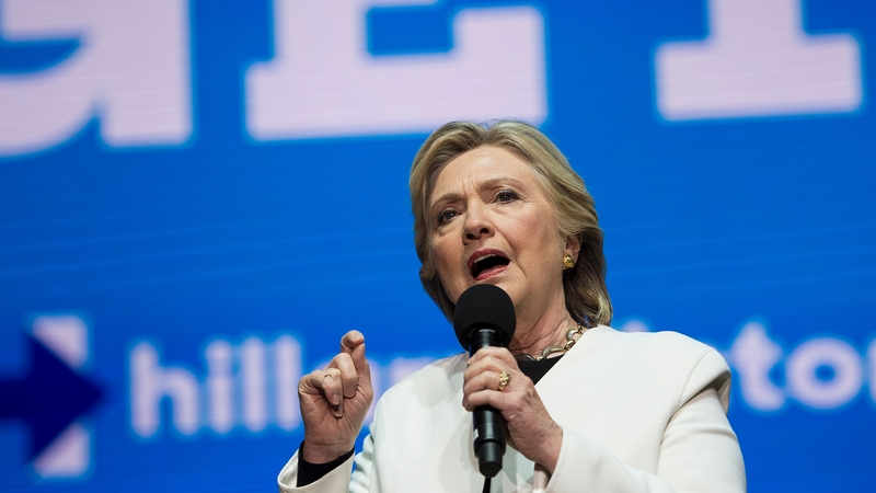 Hillary Clinton maintains a narrow lead over her rival