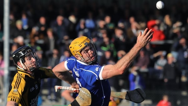 Tony Kelly (l) and Padraic Maher battle for possession at Cusack Park