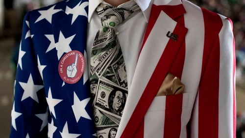 A Trump supporter dressed in a Stars and Stripes sports coat