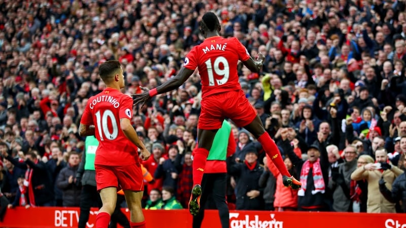 Sadio Mane celebrates his opening goal against Watford