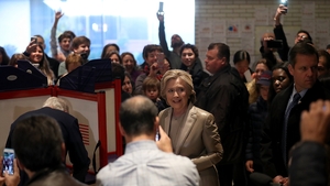 Democratic presidential nominee Hillary Clinton is surrounded by people as she votes at a school in Chappaqua, New York