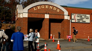 A voter enters the Legends theatre polling place in Boone, North Carolina