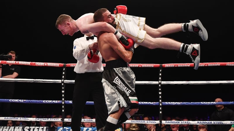 Stefan Slavchev gives Paddy Barnes a fireman's lift