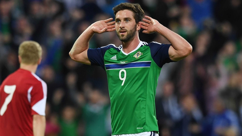 Will Grigg celebrates a friendly goal against Belarus