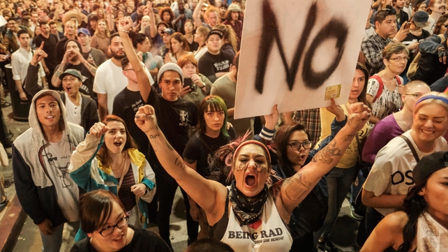 Demonstrators at a rally outside City Hall in Los Angeles