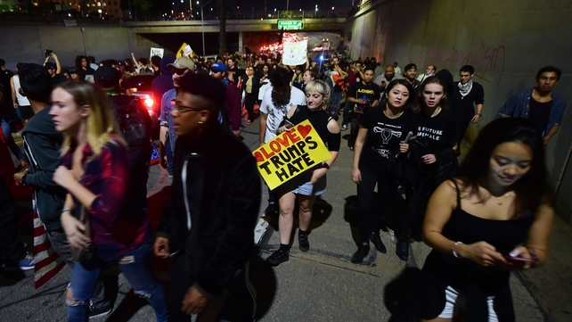 Traffic chaos as protesters block a highway on ramp in Los Angeles